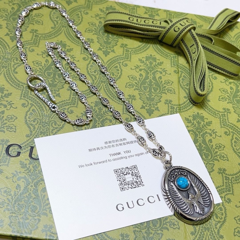 G*u*i necklaces